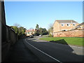 Approaching the junction of Downwood Way and Well Copse Close