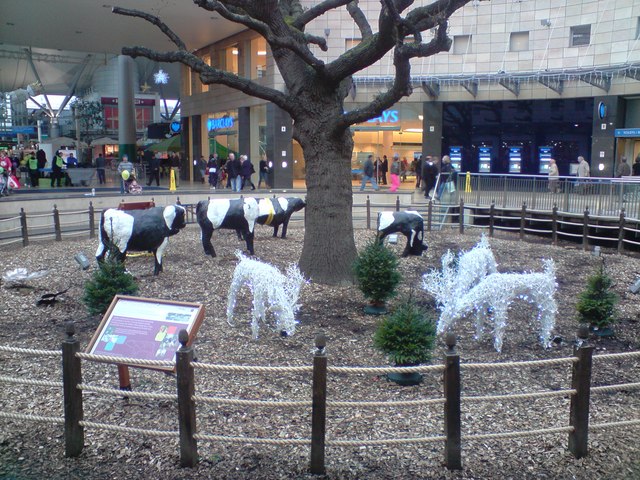 Oak tree and concrete cows at Xmas, CMK © Oliver Hunter cc-by-sa/2.0 :: Geograph Britain and Ireland