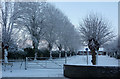 Trees in a small park by the High Street