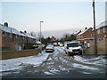 Looking from Mortimer Road into a snowy Cinderford Close