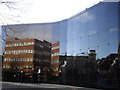 Reflection in office block in Princess Street Ipswich