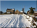 Houses at Pratthall, and footpath , with snow