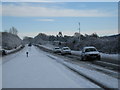 Traffic on the A171 road (view east)