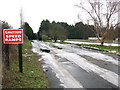 Icy road past caravan site