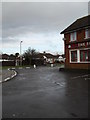 Looking across from The Falcon to a bus shelter in Sunnymead Drive