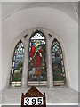 Small stained glass window within St Mary, East Lavant