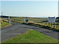 SY9179 : Road junction above Kimmeridge village by Phil Champion