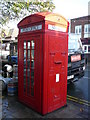 Rare style of telephone box and stamp machine , Church Street, Frodsham.