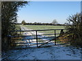 SU2484 : Gated field entrance off the Bishopstone road by Nick Smith
