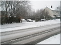 Looking across a snowy Barncroft Way towards Georgia Close