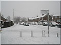 Junction of Timsbury Crescent and a snowy Woodgreen Avenue