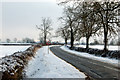 Looking east at snow along Welsh Road, Southam