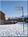 Looking from a snowy Crookham Close into Grateley Crescent