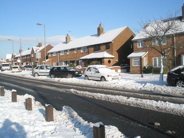 Snow covered homes in Middle Park Way