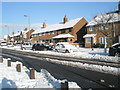 Snow covered homes in Middle Park Way