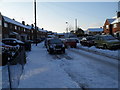 Looking westwards along a snowy Hordle Road