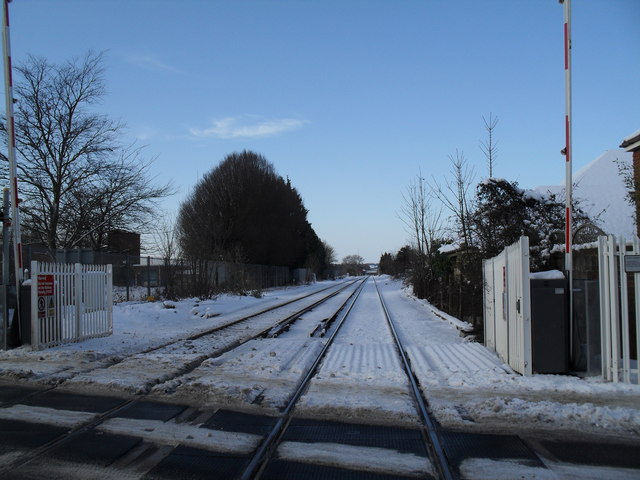 Looking from Warblington Station down a snowy trackside to Havant Station