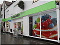 The Co-Op in a very wet Queen Street