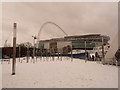 TQ1985 : Wembley: the stadium from snow-covered footbridge by Chris Downer