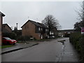 Approaching the junction of  Ascot Way and Guildford Road