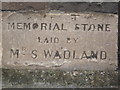 One of four memorial stones on the front of one of the Christ Church buildings on East Street