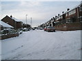 Looking from East Cosham Road into a snowy Courtmount Grove