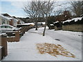 Approaching the junction of a snowy East Cosham Road