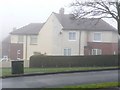 Houses stepping downhill, at the junction of Greenwood Road and Shepley Street