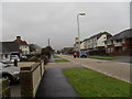 Retreating postie in  Road