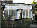 Shop front of T & L Coopers Ltd, butcher and baker