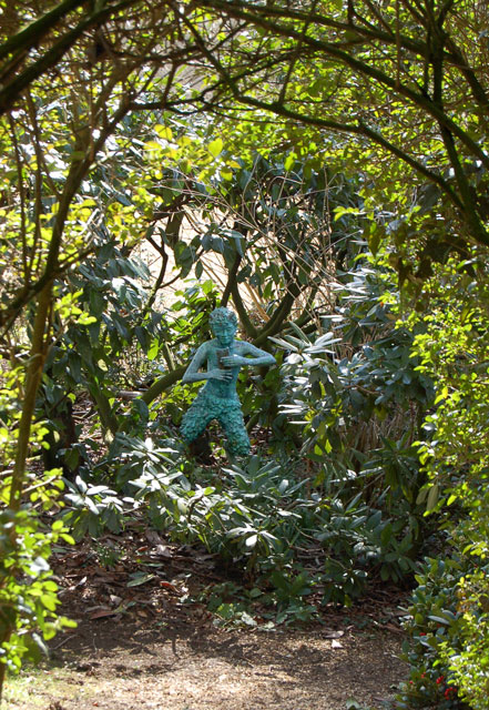 Statue of Pan in Coton Manor Gardens