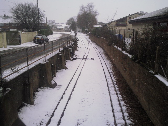 Snowy view from New Romney station road bridge