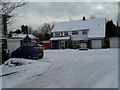 Snow covered homes in Orchard Road