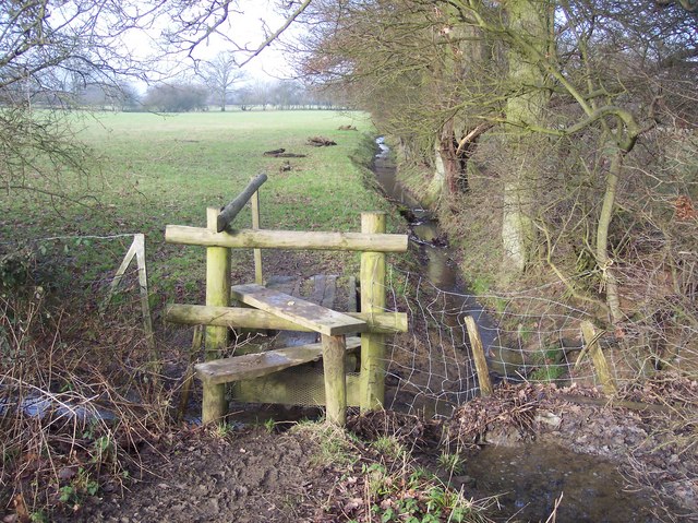 Stile and footbridge near Little Odiam