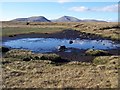 NC5922 : A peaty lochan - the source of the River Brora. by Nick Lindsay