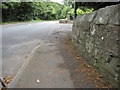 Roadside wall and a bench mark