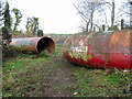 Colourful pipes laid across path