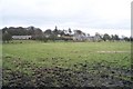 A view across farmland to Beacon Hill