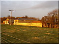 A collection of barns.