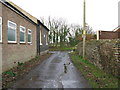 View along minor road to the High Street, Manston