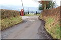 Junction with a telephone box