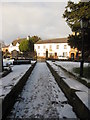 The north path and gates at All Saints, Gresford