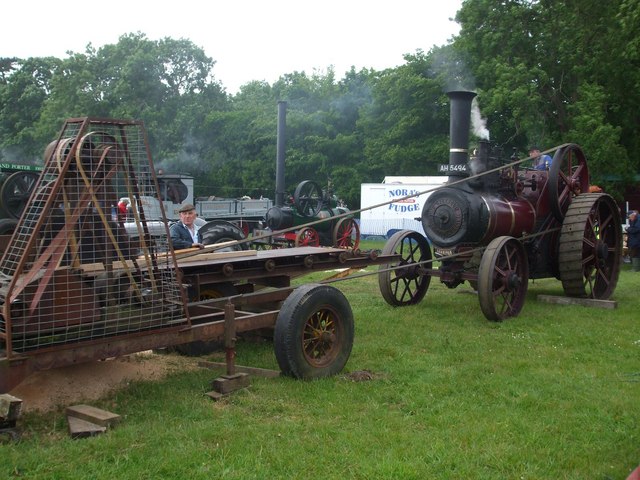 Burrell traction engine sawing planks