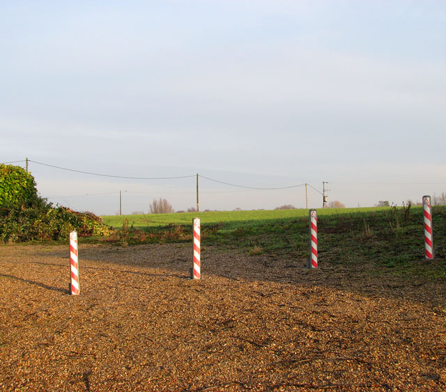 Bollards and poles east of Acle Road