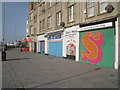 TQ8209 : Painted Shutters on Sturdee Parade by Oast House Archive
