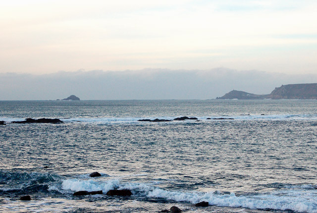 View over Cowloe rocks towards The Brisons island and Cape Cornwall