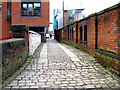 Manchester:  Old paving alongside Ducie Street