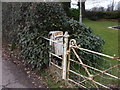 Disused post-box inside the garden of Roughton Lodge