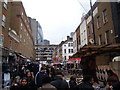 View of the Gherkin and buildings on Middlesex Street from Petticoat Lane Market