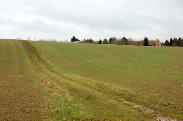Farm track up a hill southwest of Flecknoe